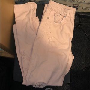 ripped light pink jeans